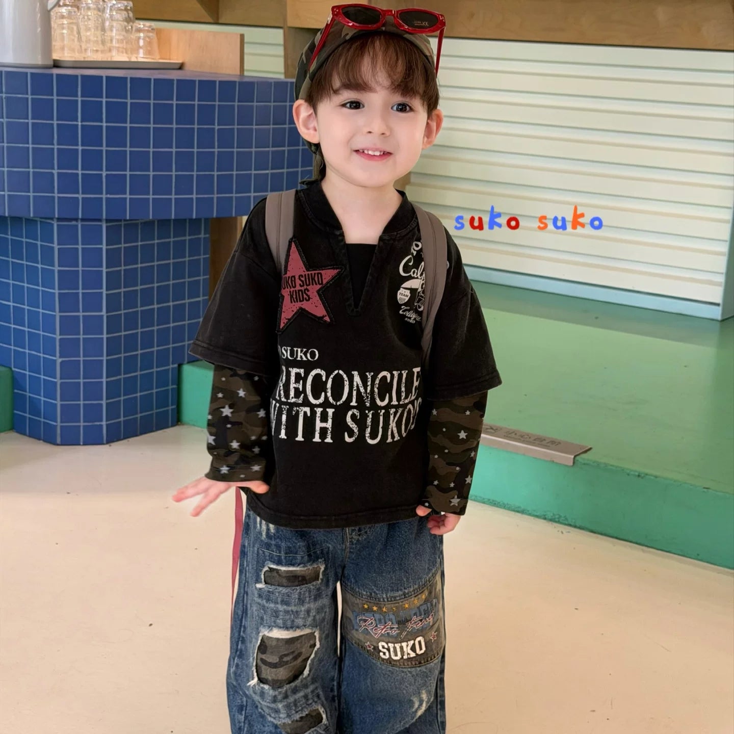 Suke 26 Autumn New Boys' American Retro Style Fake Two piece Camouflage Splicing Long Sleeve T-shirt Children's Piercing Jeans
