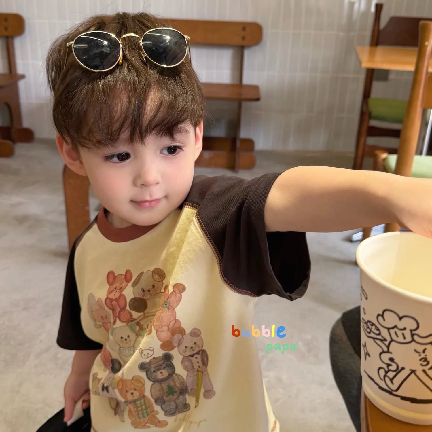 2026 summer new boys' and children's Korean version cartoon teddy bear color blocked short sleeved T-shirt, stylish loose lantern shorts
