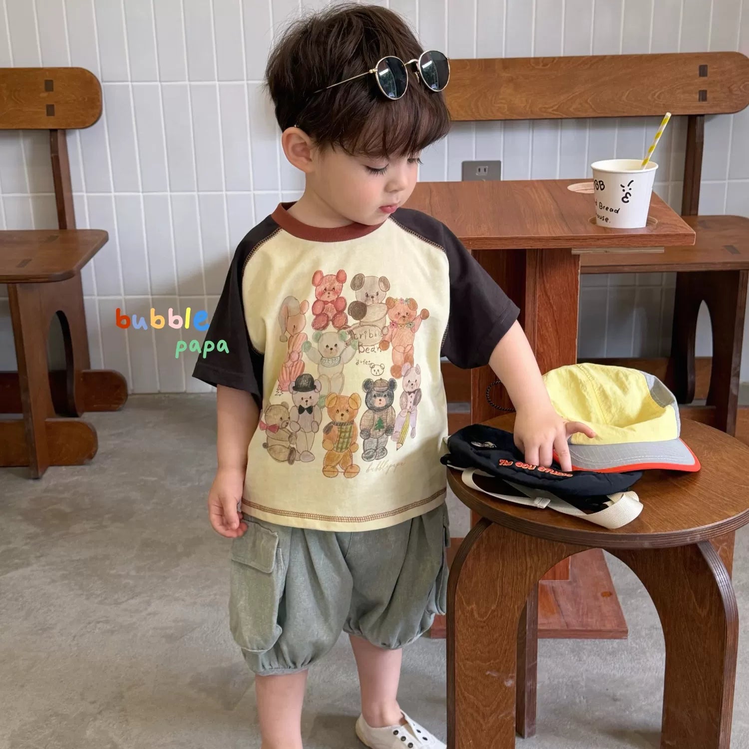 2026 summer new boys' and children's Korean version cartoon teddy bear color blocked short sleeved T-shirt, stylish loose lantern shorts