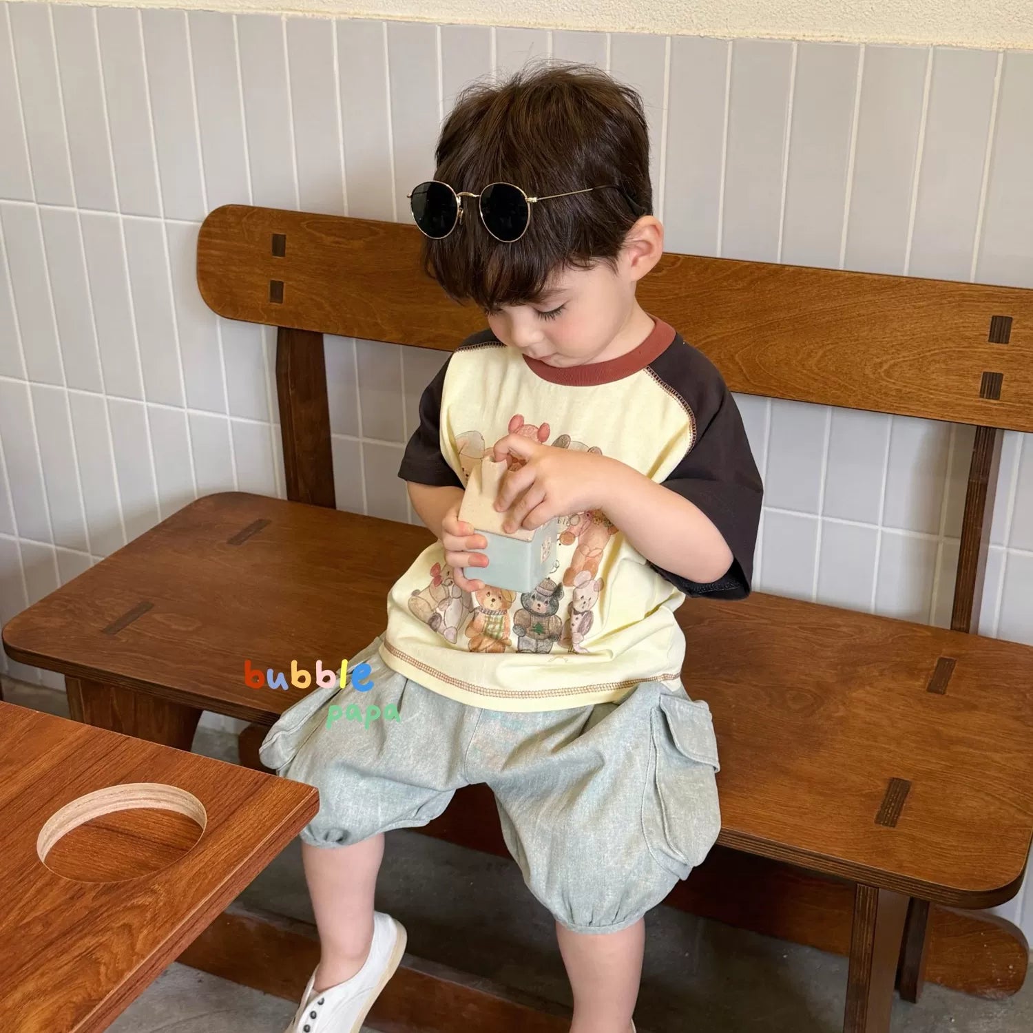 2026 summer new boys' and children's Korean version cartoon teddy bear color blocked short sleeved T-shirt, stylish loose lantern shorts