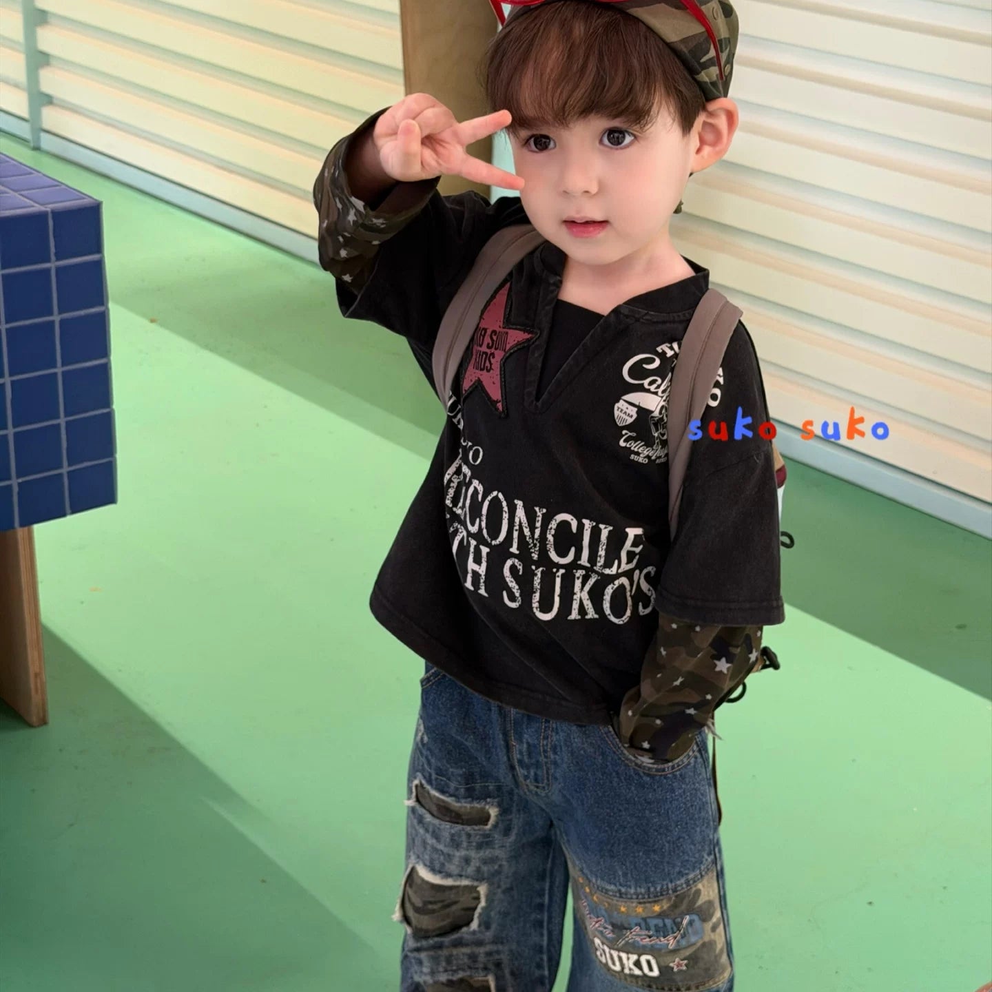 Suke 26 Autumn New Boys' American Retro Style Fake Two piece Camouflage Splicing Long Sleeve T-shirt Children's Piercing Jeans