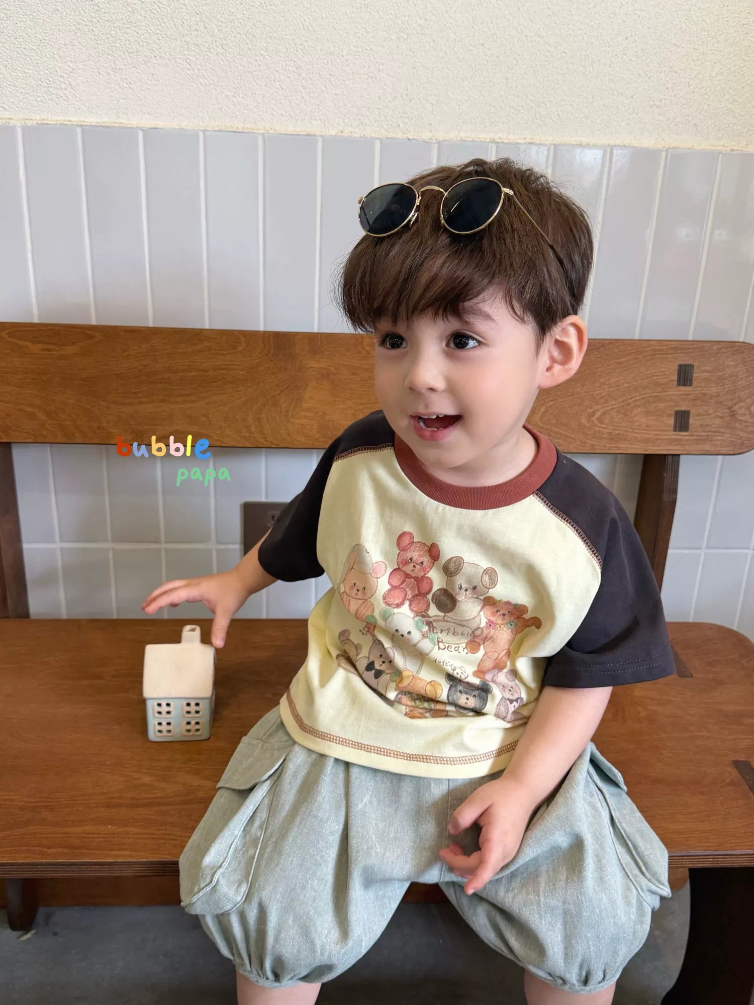 2026 summer new boys' and children's Korean version cartoon teddy bear color blocked short sleeved T-shirt, stylish loose lantern shorts